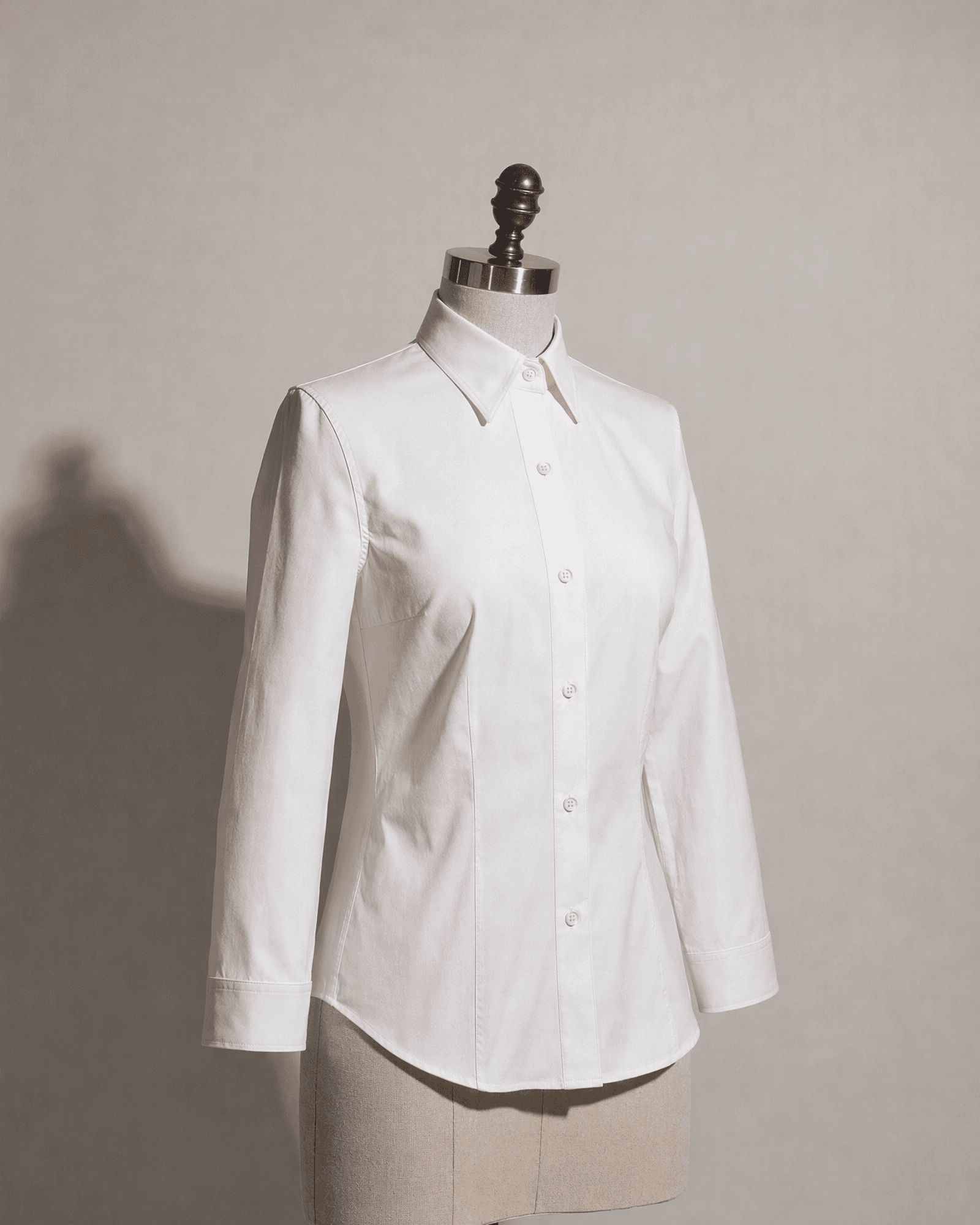 fitted shirt on a dress form